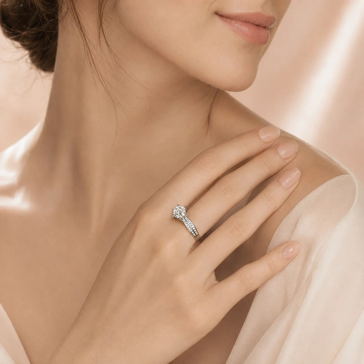 Split-shank moissanite ring worn on a model's hand