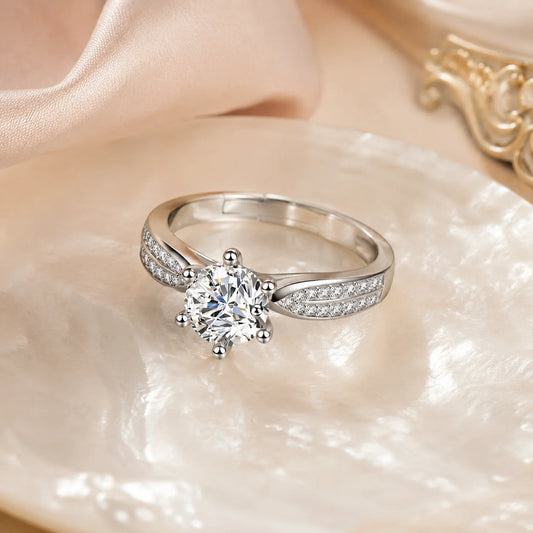 Eros' Aile split-shank ring resting on a shell dish