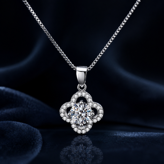 Close-up of Rosette four-petal halo moissanite pendant and box chain