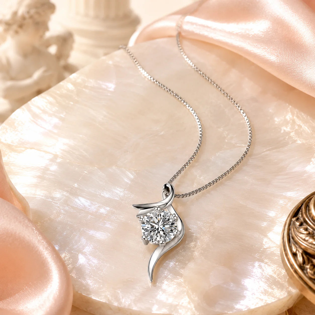 SENTO Eros Flux moissanite necklace on marble shell cupid angel column blush silk