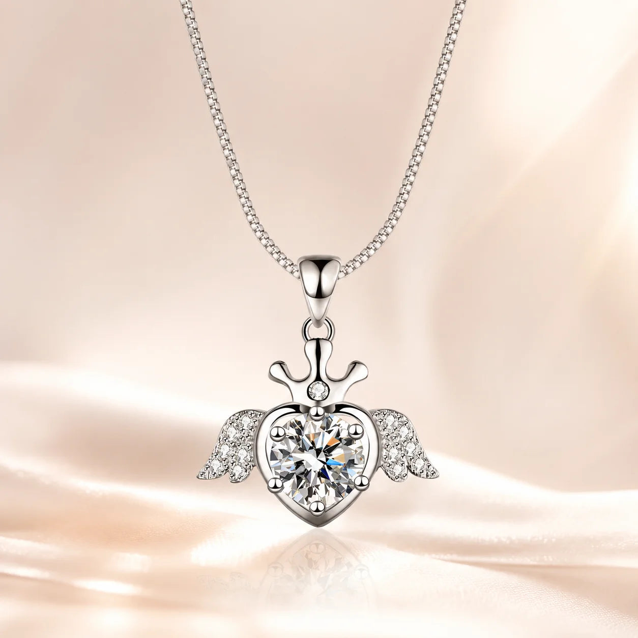 SENTO Eros Seraph pendant full view blush silk background editorial warm luxury