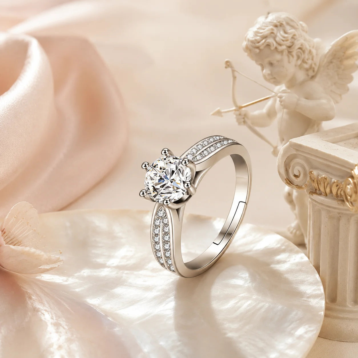 SENTO Eros Aile double-row pave split shank moissanite ring on marble cupid column background