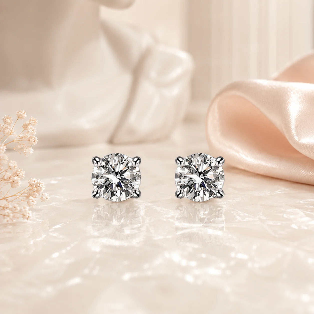 SENTO Eros Pure round brilliant moissanite stud earrings pair on marble warm editorial