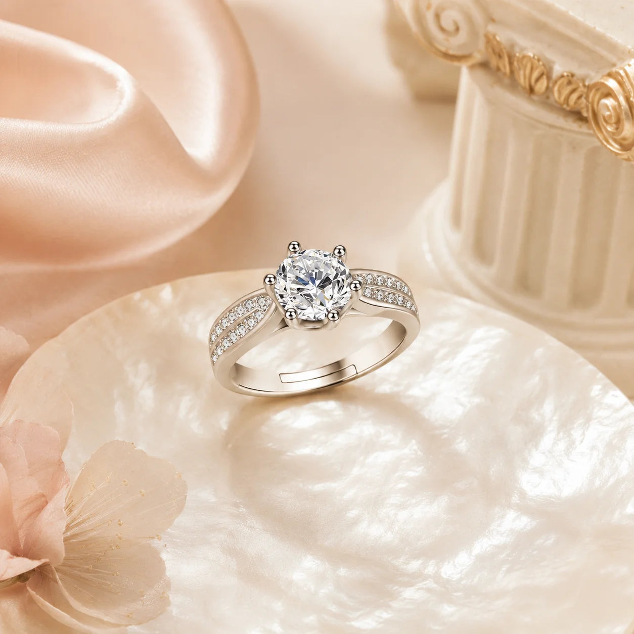 SENTO Eros Aile split shank moissanite ring on marble disk blush flower column