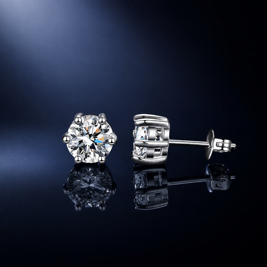 Aster six-prong round moissanite studs shown from front and side with butterfly back