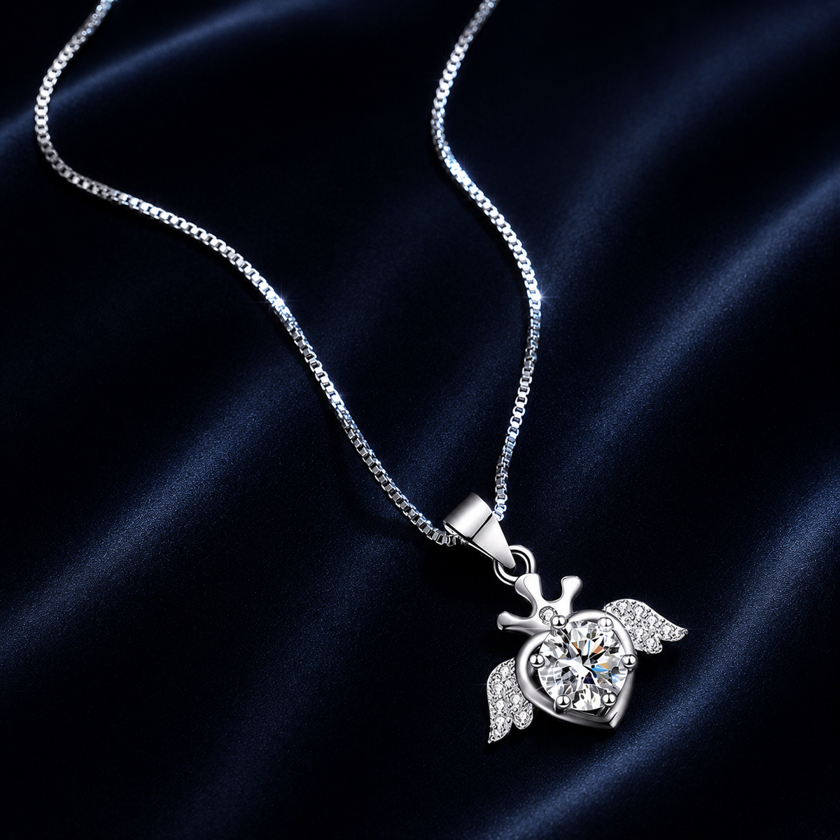 Plume winged crown heart moissanite pendant necklace on dark blue velvet
