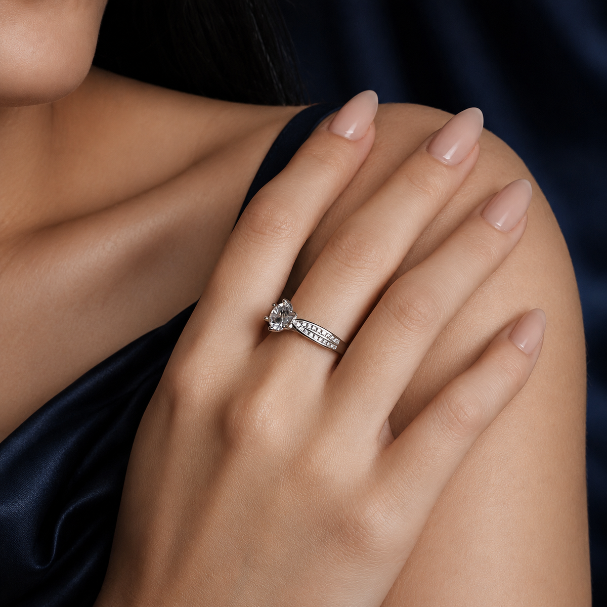 Model wearing Duet six-prong moissanite ring with double pave split shank