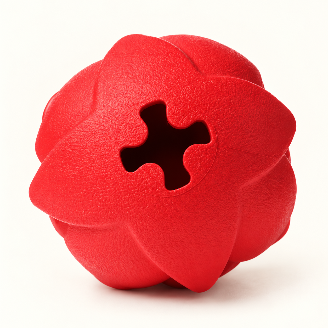Underside of the red Dragon Fruit toy showing its four-lobed treat opening
