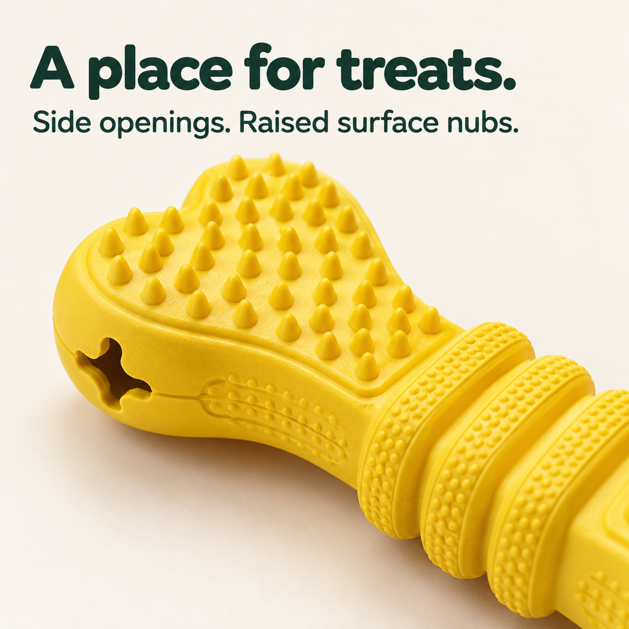 Close-up of the yellow Treat Bone side opening and raised nubs