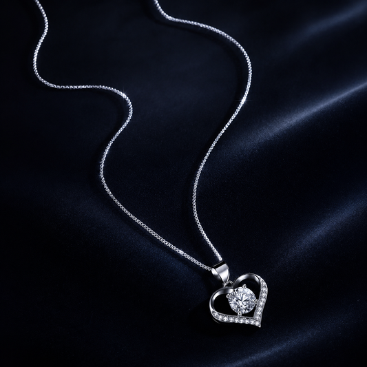 Murmur open-frame heart moissanite pendant necklace on dark blue velvet