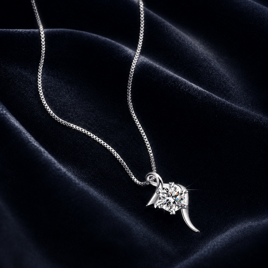 Drift S-curve fluid frame moissanite pendant necklace on midnight blue velvet