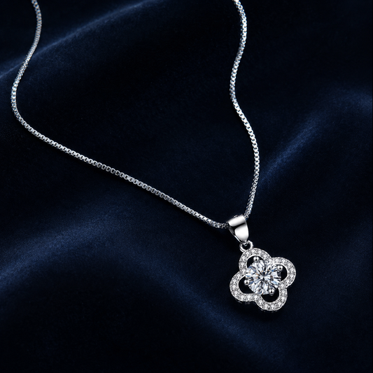 Rosette four-petal halo moissanite pendant necklace on dark blue velvet
